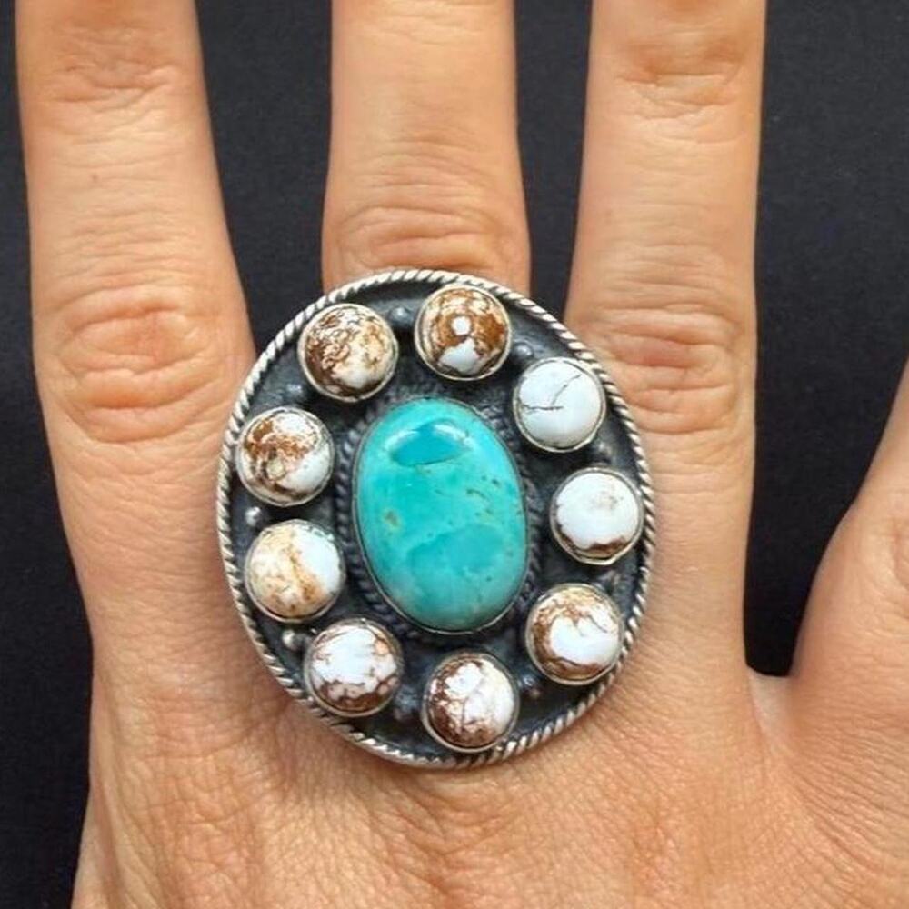 Massive handmade sterling silver turquoise & wild horse ring. Adjustable
